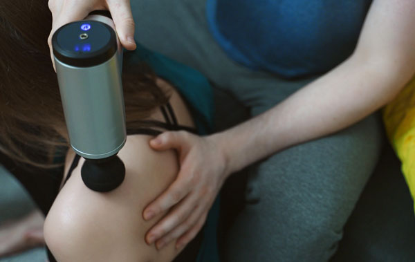 Massaging using massage gun