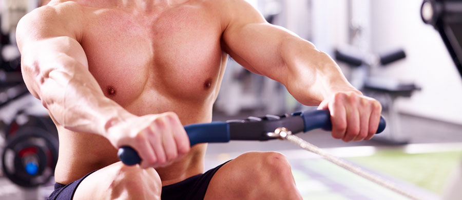 Man training to have hard rock abs