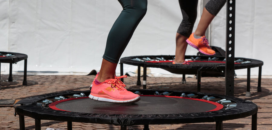 Woman using trampoline