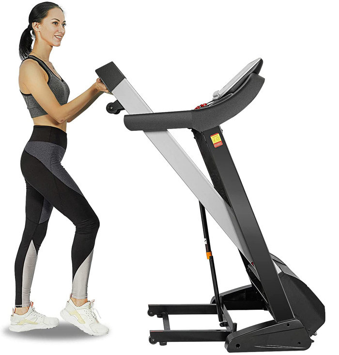 woman folding treadmill